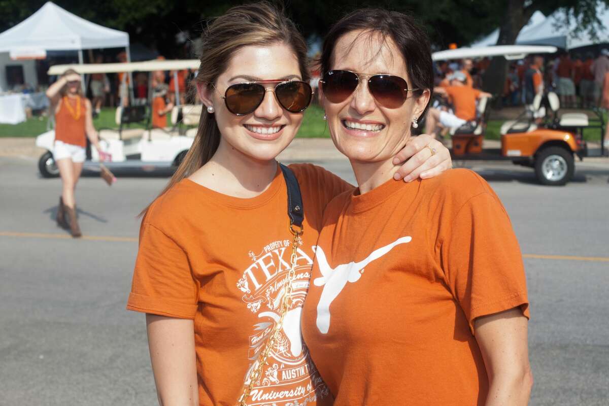 Longhorns fans packed Central Austin in a huge roving tailgate/general opening day party Sunday afternoon, Sept. 4, 2016, as their beloved team readied to take on Notre Dame in the first college football game of their 2016 season.