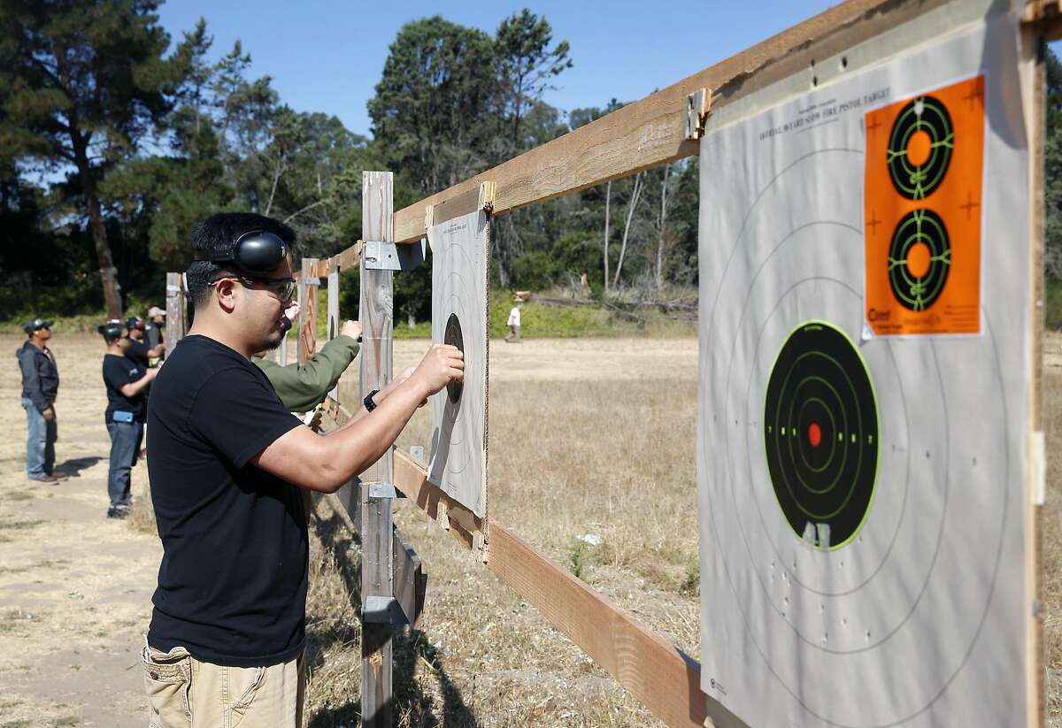 First-time shooter Richard Siao sets his target down range at the Chabot Gun Club in Castro Valley, Calif. on Sept. 5, 2016. The rifle and pistol range will cease firing after Labor Day before its lease with the East Bay Regional Parks District expires on Sept. 20.