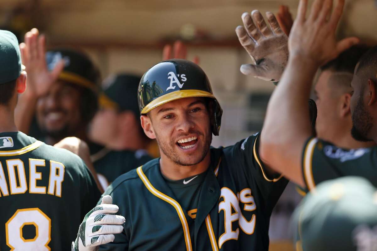 Oakland Athletics' Danny Valencia celebrates his 2-run home run against Los Angeles Angels during MLB game at Oakland Coliseum in Oakland, Calif., on Monday, September 5, 2016.