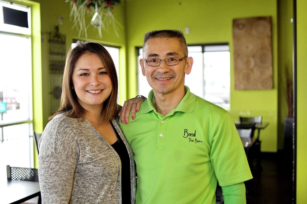 Two of the owners of Basil Thai Bistro, father and daughter Sami Ung, left, and Hugh Miller.