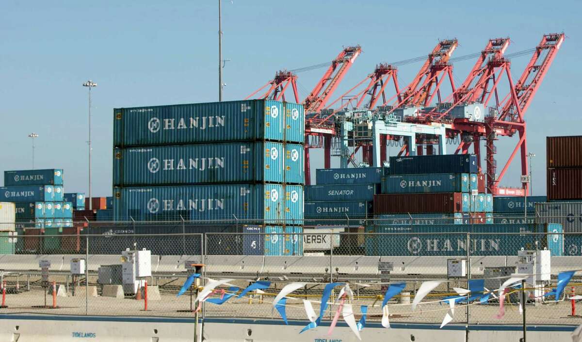 South Korea's Hanjin Shipping Co. containers are seen in the Port of Long Beach, Calif. With the company’s assets frozen, its ships are being refused permission to offload or take on containers at ports worldwide, out of concern tugboat pilots or stevedores may not be paid. Out of 141 vessels the company operates, as of Sunday, 68 were not operating normally, were stranded or were seized.