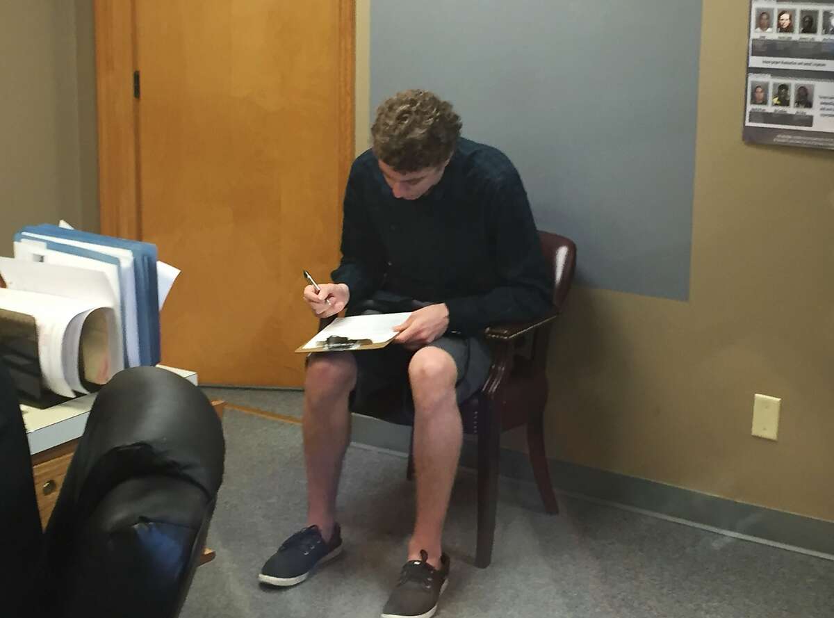 Brock Turner registers as a sex offender at the Greene County sheriff's office on Tuesday, Sept. 6, 2016, in Xenia, Ohio. The former Stanford University swimmer whose six-month sentence for sexually assaulting an unconscious woman sparked a national outcry, registered days after leaving a California jail after serving half his term. (Jarod Thrush/Dayton Daily News via AP)