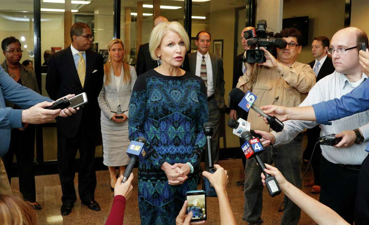 ﻿Dallas County District Attorney Susan Hawk, shown at a 2015 ﻿news conference outside of her office ﻿in Dallas, ﻿has spoken publicly about her battles with depression and anxiety. She resigned her office on Tuesday, ﻿﻿ a month after returning to work following her third inpatient treatment for mental illness. ﻿