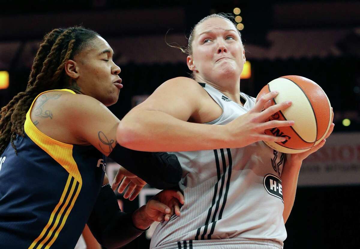Center Jayne Appel-Marinelli muscles her way through the paint against Erlang Larkins as the Stars host Indiana at the AT&T Center on Sept. 6, 2016.