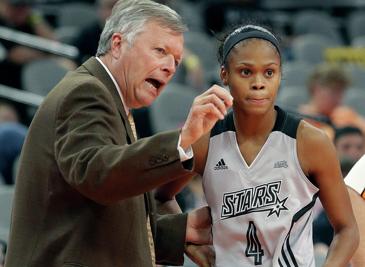 Coach Dan Hughes instructs his point guard Moriah Jefferson as the Stars host Indiana at the AT&T Center on Sept. 6, 2016.
