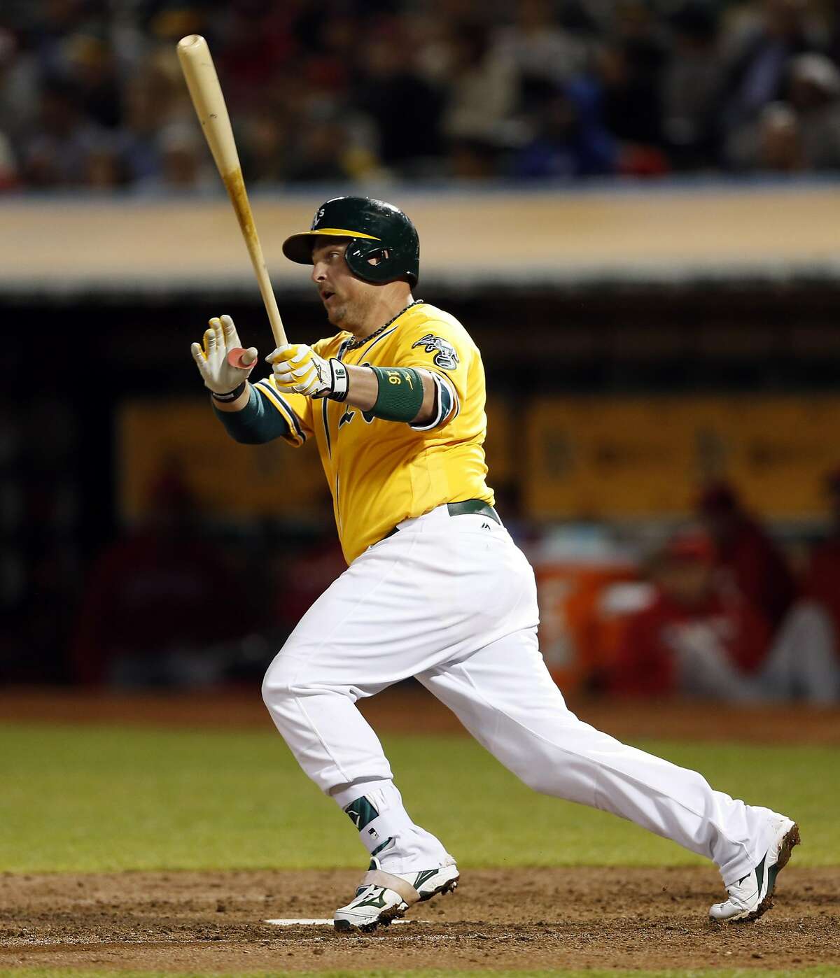 Oakland Athletics' Billy Butler singles in 8th inning of A's 3-2 win over Los Angeles Angels in MLB game at Oakland Coliseum in Oakland, Calif., on Tuesday, September 6, 2016.