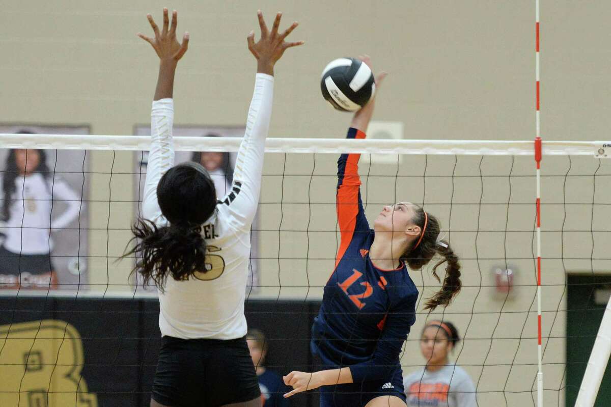 Sept. 6: Seven Lakes def. Foster 20-25, 25-10, 25-16, 25-17 Natalie Pashby (12) of Seven Lakes reaches for a kill shot during the third set of a non-district volleyball game between the Seven Lakes Spartans and Foster Falcons on September 6, 2016 at Foster High School, Richmond, TX.