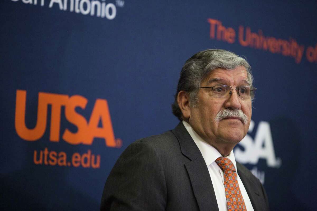 University President Ricardo Romo talks about his retirement during a press conference at the H-E-B University Center at the University of Texas at San Antonio recently. There are still unanswered questions about his departure.