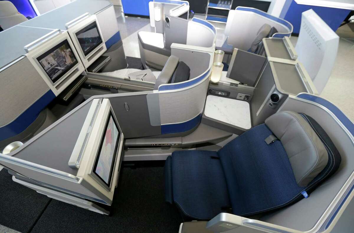 United Airlines' Time Off in Tahiti contest will send the country's "hardest-working person" and a guest on a trip to Tahiti. They will fly Polaris business class (pictured). Keep going to see the Polaris airport lounge at Bush Intercontinental Airport.