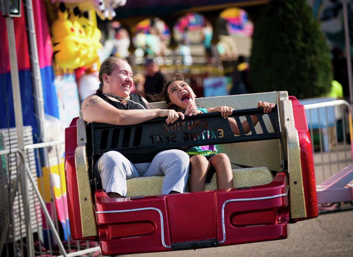 Florence Jack and Airianna Jack, 8, rode the Sizzler at the﻿ Minnesota State Fair.﻿