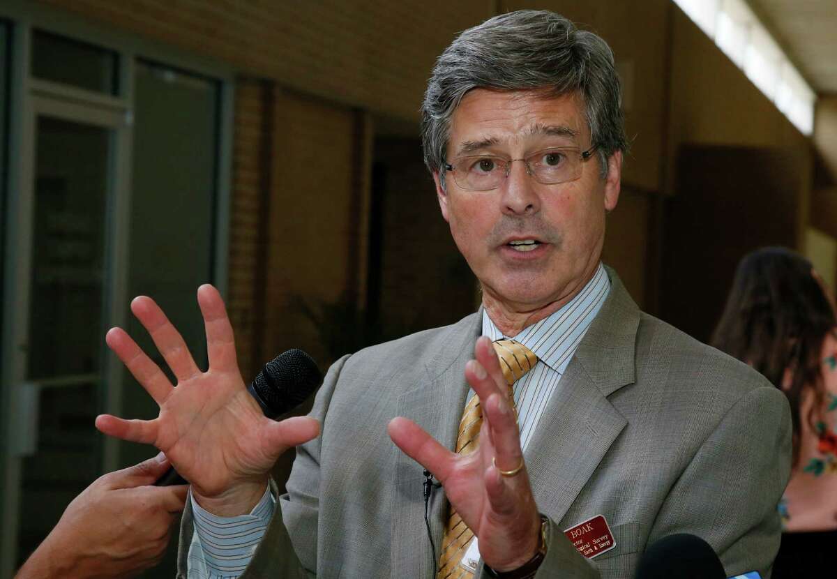 Jeremy Boak, Director of the Oklahoma Geological Survey, gestures as he answers a question at a news conference during a break in a workshop of Seismicity in Oklahoma, in Norman, Okla., Wednesday, Sept. 7, 2016. U.S. Geological Survey researchers say they're upgrading the strength of an Oklahoma earthquake that rocked the state over the weekend to a 5.8 magnitude, making it the most powerful earthquake ever recorded in the state. (AP Photo/Sue Ogrocki)