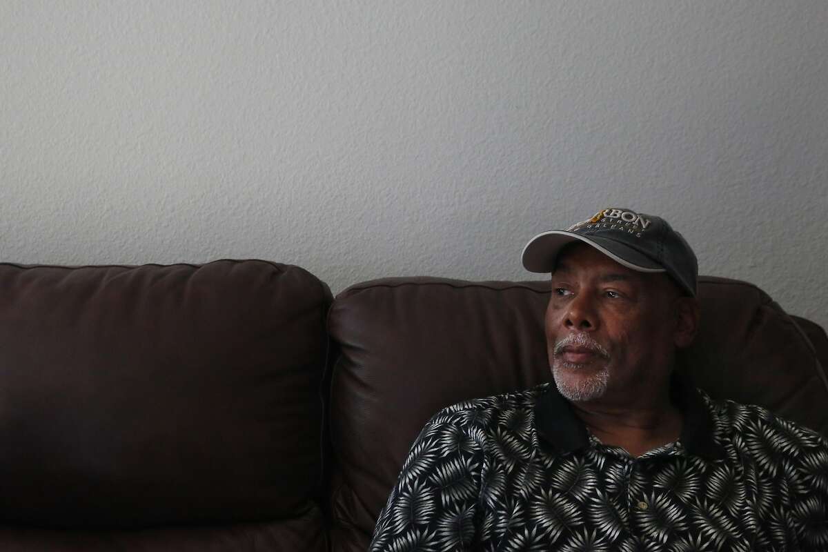 Vincent Justin, 68, listens as he sits with fellow residents in his neighbor Sharon Brown's apartment during an interview with the San Francisco Chronicle in the Creek View apartment complex Sept. 7, 2016 in El Sobrante, Calif. Residents of the complex were served with eviction papers telling them to vacate by the end of the month.