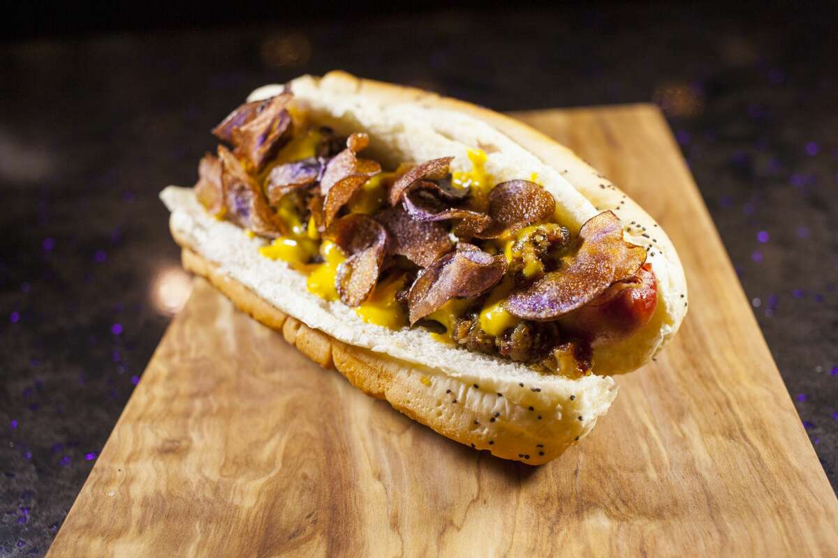 Skol Dog 2 - U.S. Bank Stadium Prairie Dogs’ house-made hot dog topped with bacon jam, yellow mustard and purple potato chips.