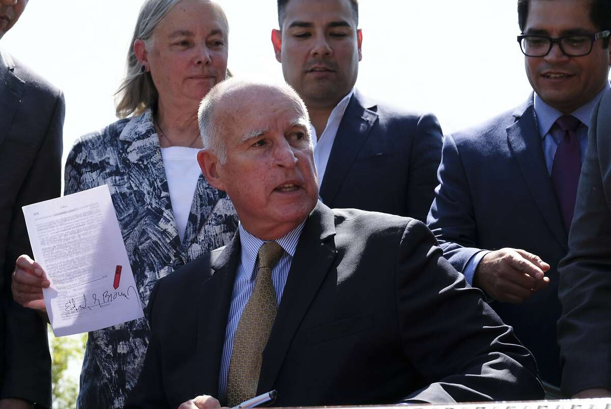 The two landmark climate bills signed Thursday by Gov. Jerry Brown cemented an unexpectedly strong alliance of labor unions, grassroots “environmental justice” organizations and environmentalists.