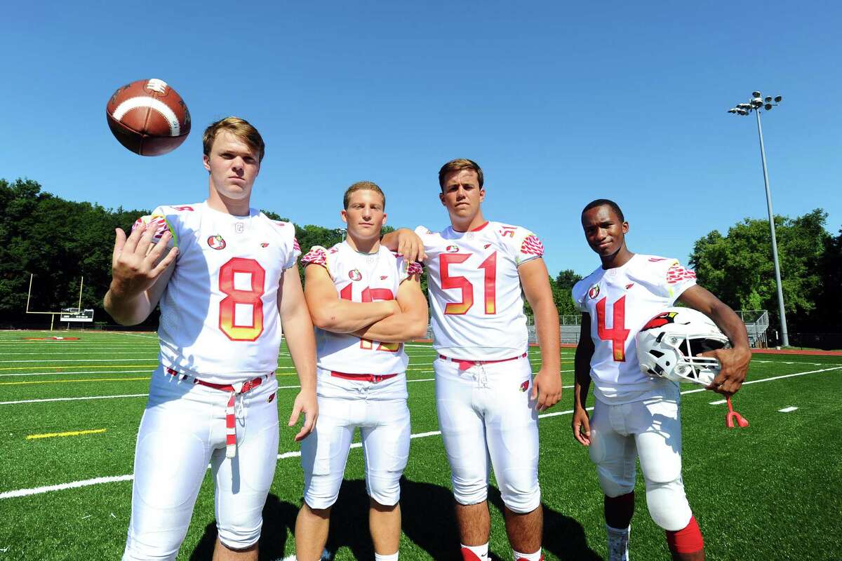 Greenwich High School football team captains, from left, linebacker Paul Williams, linebacker Mike Ceci, lineman Ben Krainger and wide receiver Tyler Farris at Cardinal Stadium in Greenwich, Conn. on Sunday, August 28, 2016.