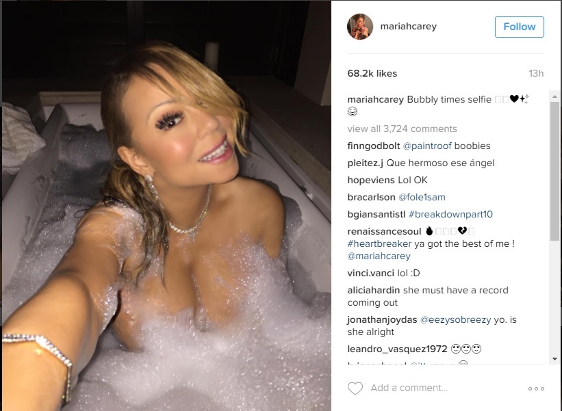 Mariah carey flaunts flat tummy in bikini after insider claimed she had multiple cosmetic procedures