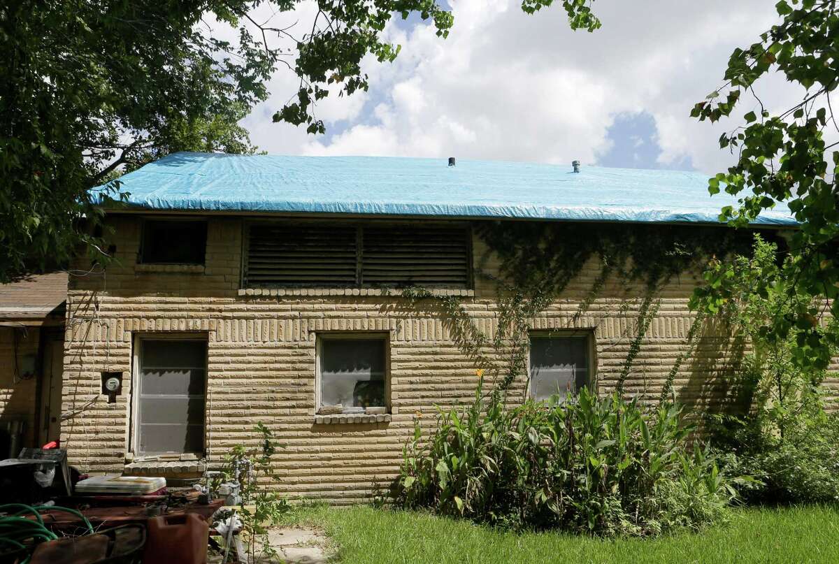 Eight years after Ike, city targets blue tarp roof repairs