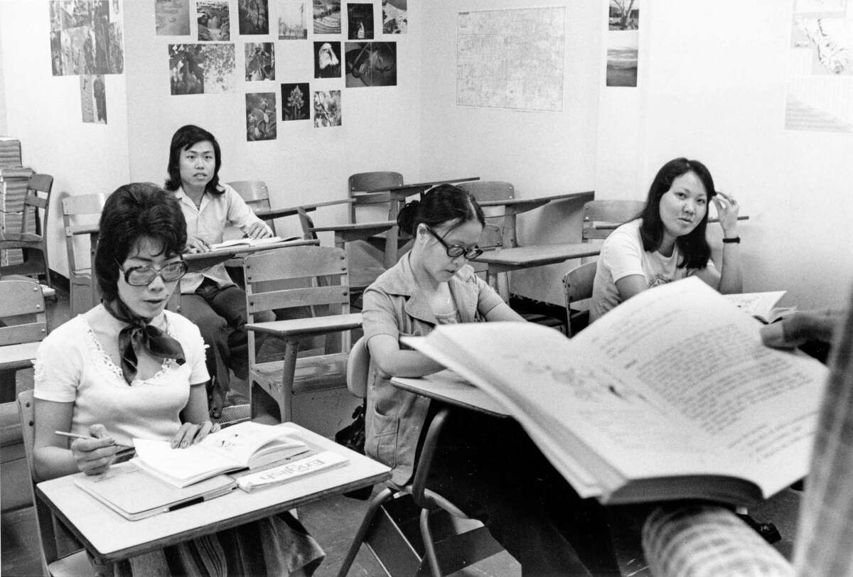 06/09/1976 - Vietnamese refugees in an English as a second language class at Houston Community College.