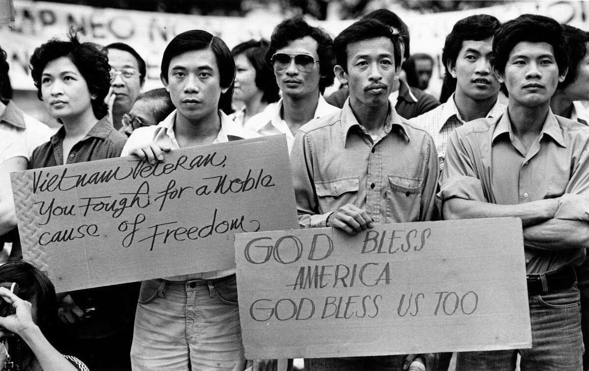 04/30/1981 - A group of Vietnamese immigrants now living in the Houston-area gathered for a ceremony on the front steps of Houston City Hall Thursday in commemoration of the sixth anniversary of the fall of South Vietnam.