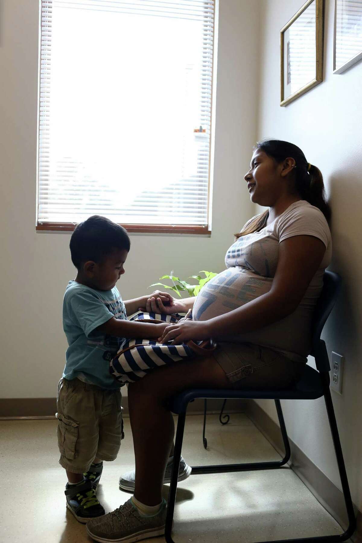 Diana Karen Valdez was eight months pregnant when she visited the Brownsville Community Health Center with her son, Mauricio, in September.
