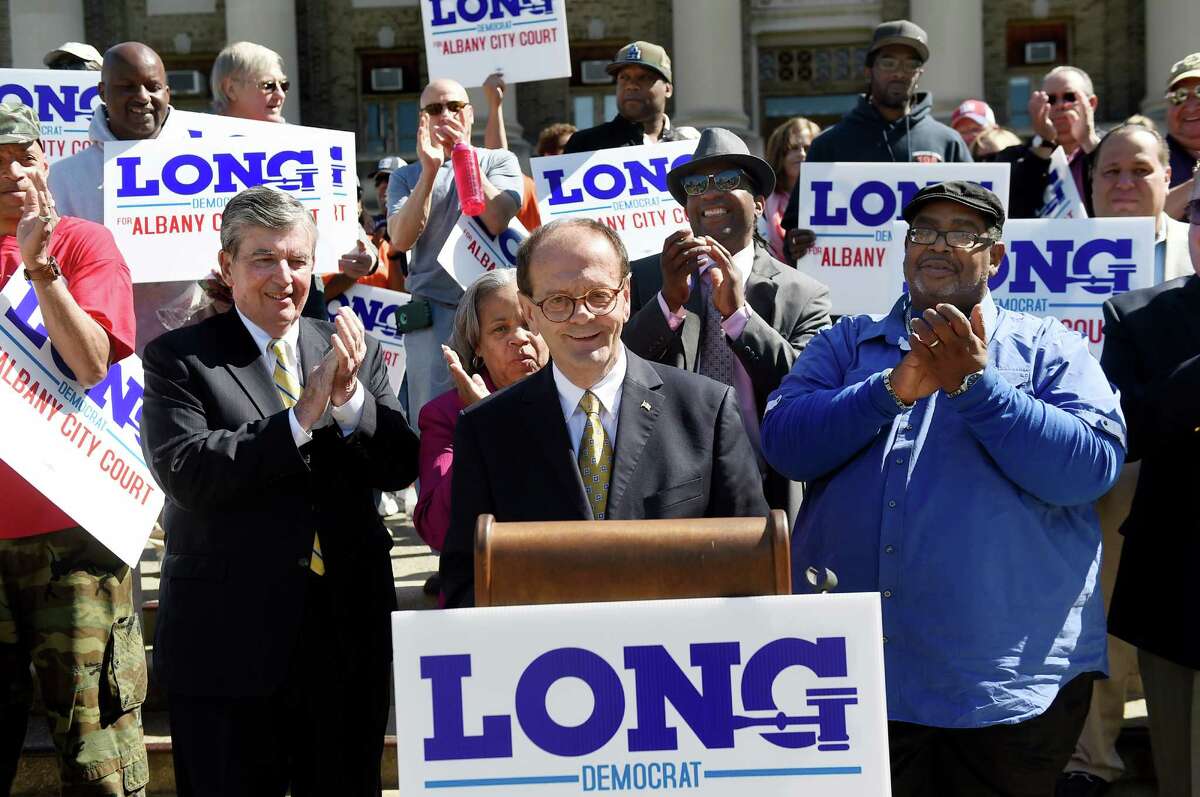 Supporters applaud as Jim Long, center, announces his candidacy for City Court judge on Wednesday, May 11, 2016, in Albany, N.Y. (Cindy Schultz / Times Union)