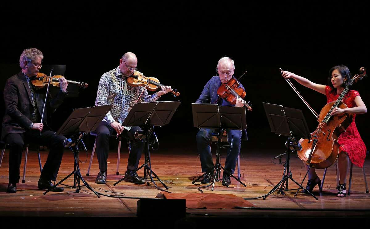 The Kronos Quartet- David Harrington, John Sherba, Hank Dutt and Sunny Yang- play Different Trains during concert to celebrate 80th birthday of composer Steve Reich at Davies Symphony Center in San Francisco, Calif., on Sunday, September 11, 2016.