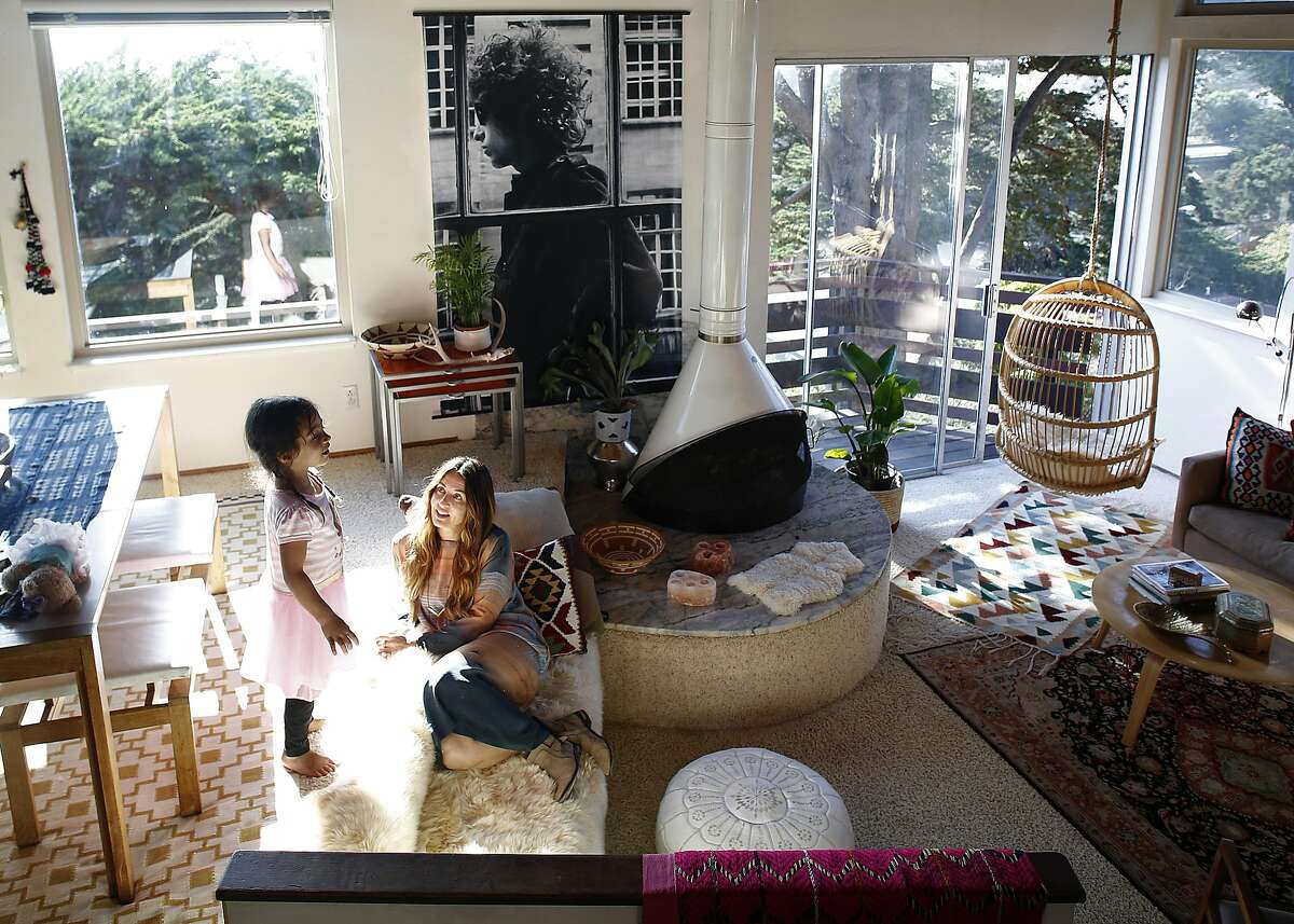 Writer Kristen Philipkoski in the living room/dining room with her daughter Frida Karimkhany, 4 years old, at home on Tuesday, September 6, 2016, in Pacifica, Calif.