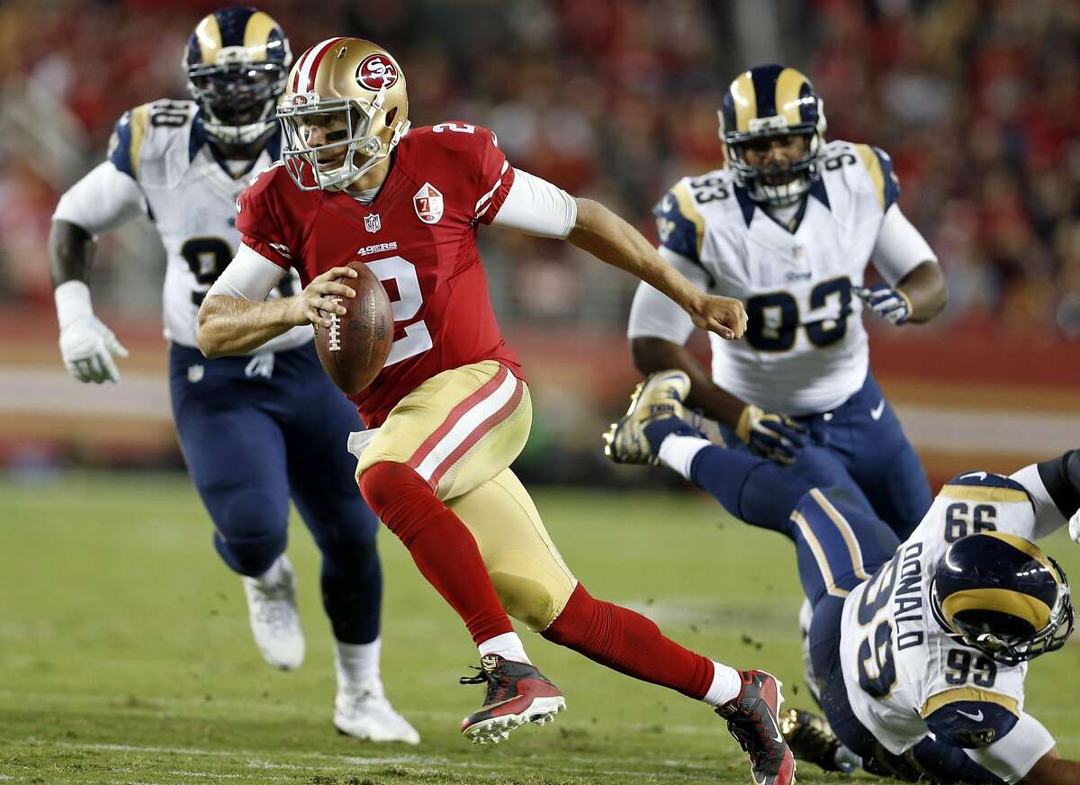 San Francisco 49ers' Blaine Gabbert scrambles in 2nd quarter against Los Angeles Rams during NFL game at Levi's Stadium in Santa Clara, Calif., on Monday, September 12, 2016.