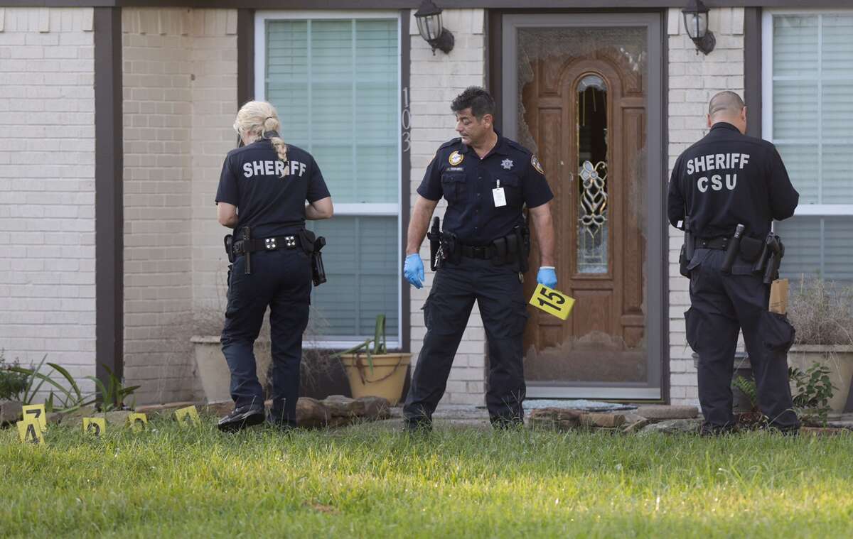 Harris County sheriff's deputies comb over a home in the 100 block of Spanish Trace Street in Crosby, Texas, on Sept. 13, 2016. Earlier that morning, a resident shot and wounded a man during an attempted home invasion.