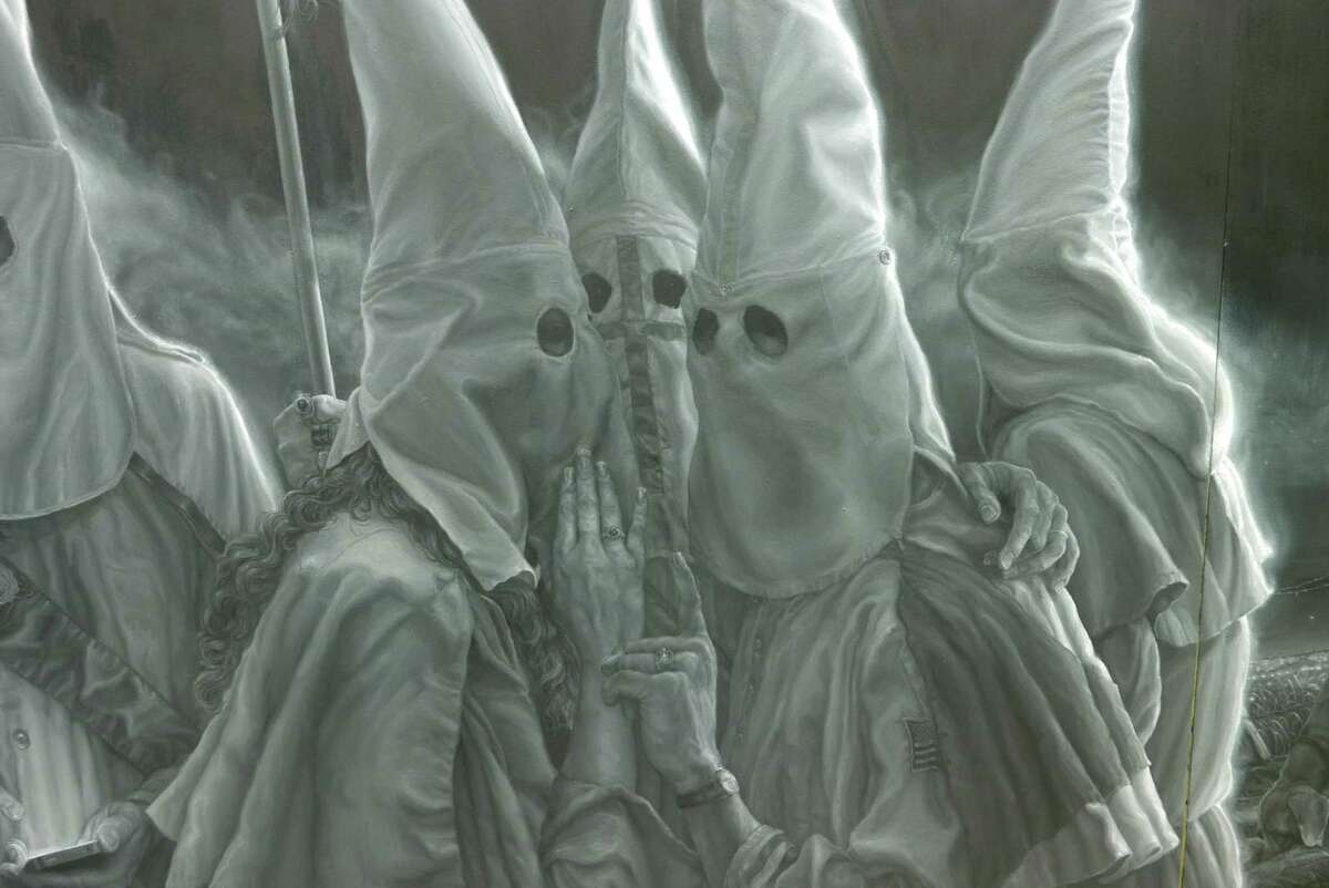 Vincent Valdez has spent a year working on a monumental painting for an exhibit at the David Shelton Gallery in Houston. This is a detail from the piece that depicts a KKK gathering and was featured in the New York Times in March 2016. The artist described the haunting image as a “selfie for 21st-century America.”
