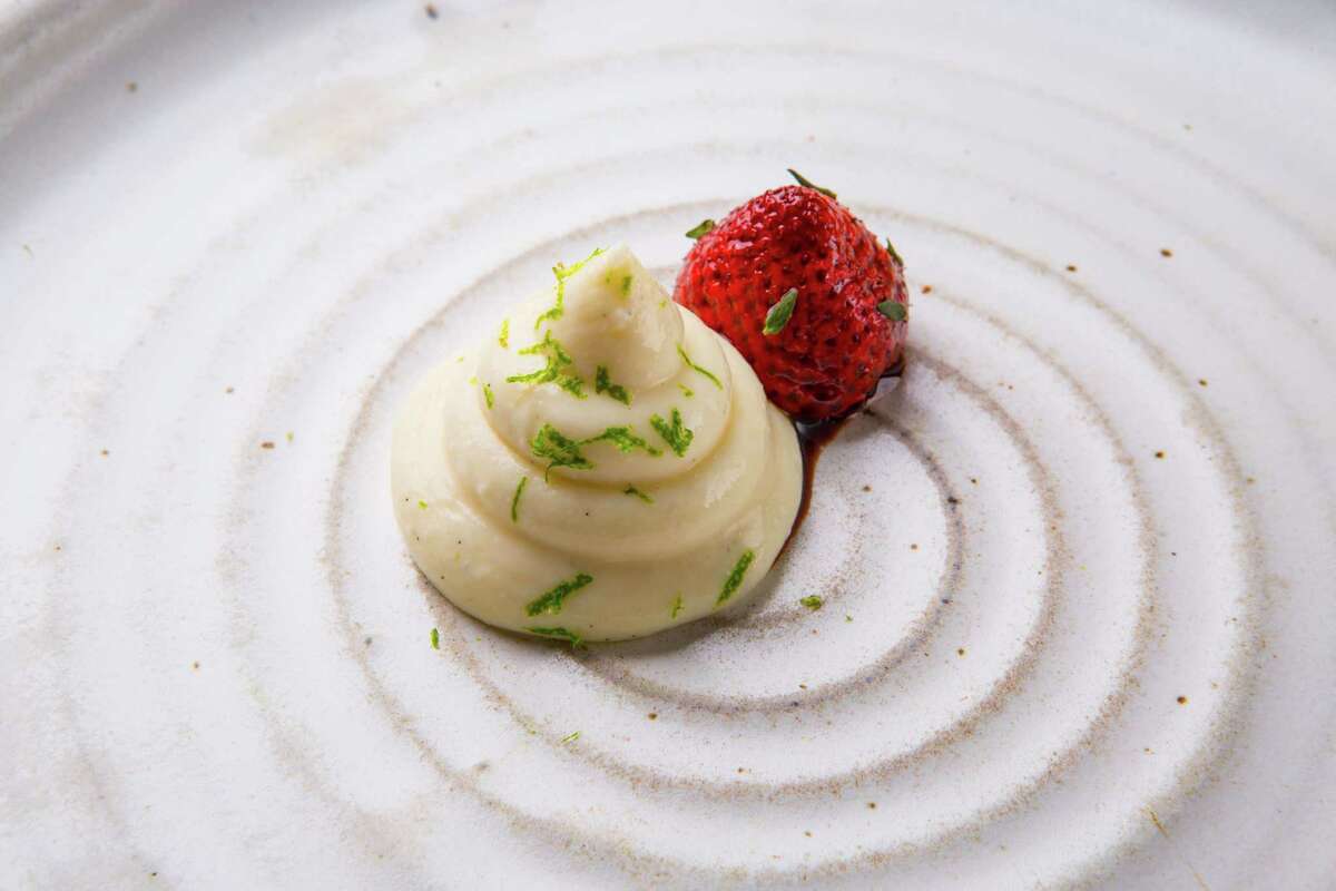Creme Fraiche cremeux with strawberries glazed in mushroom and sorghum, thyme and lime at Oxheart