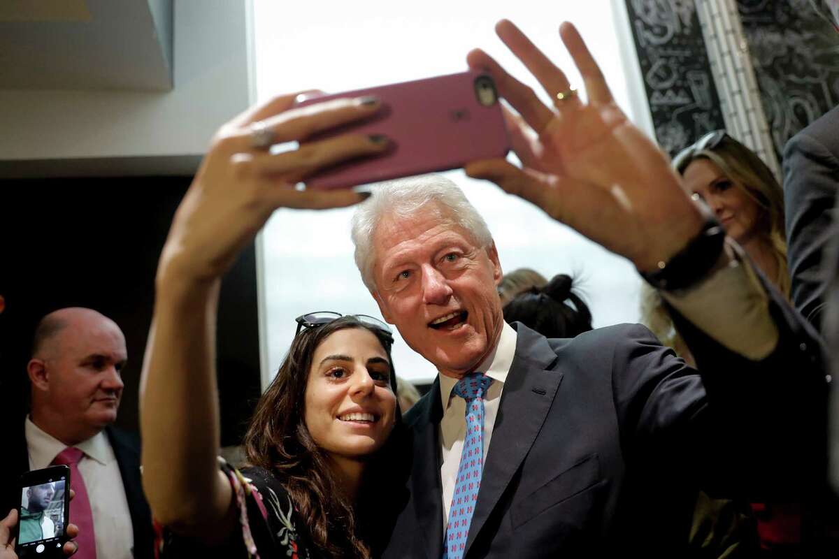 CALIFORNIA: Bill Clinton fills in for his wife at campaign fundraisers in Los Angeles.