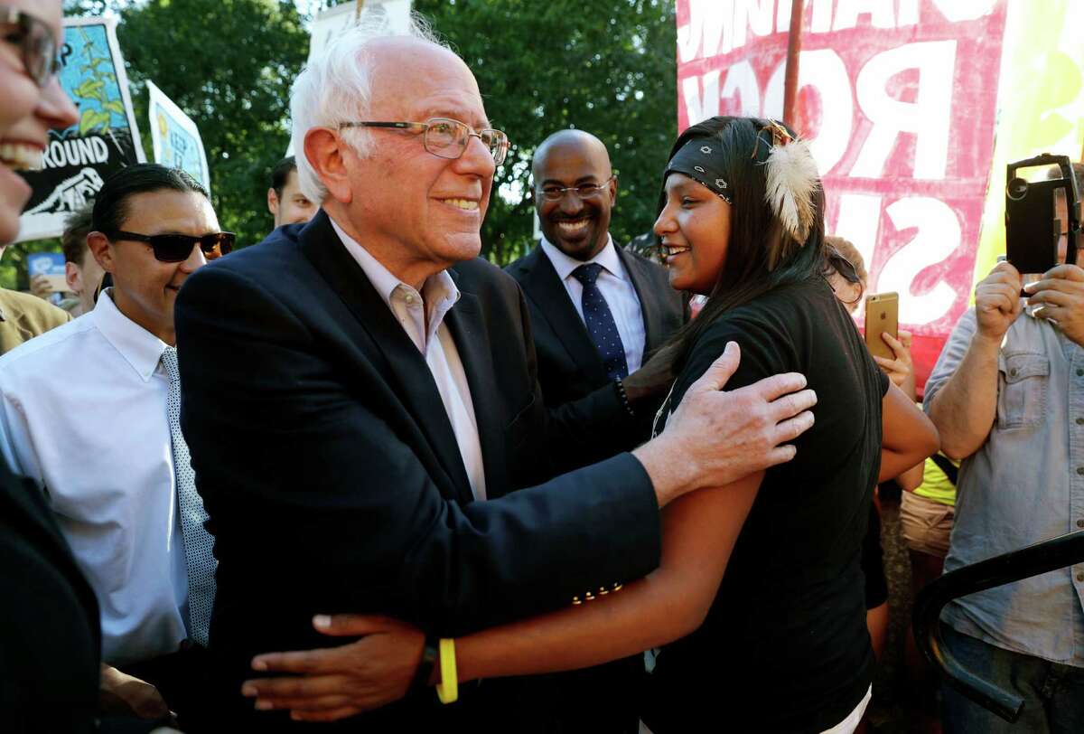 Sen. Bernie Sanders, I-Vt.,﻿ greets Jasilyn Charger, a member of the Cheyenne River Sioux Tribal Youth Council, after Charger spoke Tuesday in Washington to a group of supporters of the Standing Rock Sioux Tribe who were rallying against the Dakota Access oil pipeline.﻿
