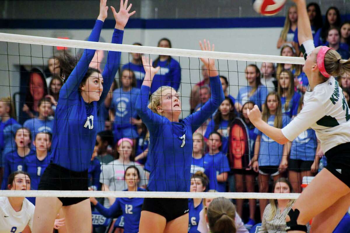 Sept. 13: Clear Falls def. Friendswood 25-23, 23-25, 28-26, 24-26, 15-12 Friendswood's McKenna Fridye (10) and Friendswood's Shannon Murphy (7) go high to block a shot by Clear Falls' Sophie Schaff (22) Tuesday, Sep. 13.