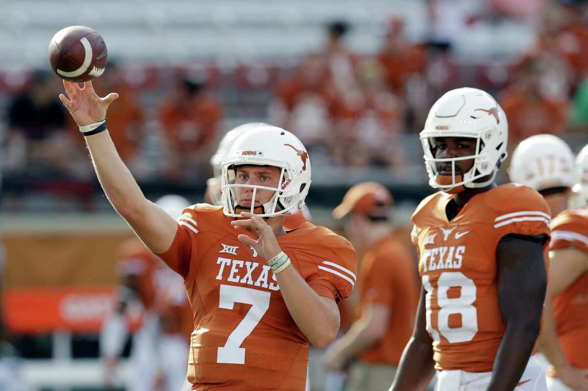 Despite being a senior, Tyrone Swoopes, right, is content backing up freshman Shane Buechele as a team-first attitude has taken hold among the Longhorns' quarterbacks with the team off to a 2-0 start.