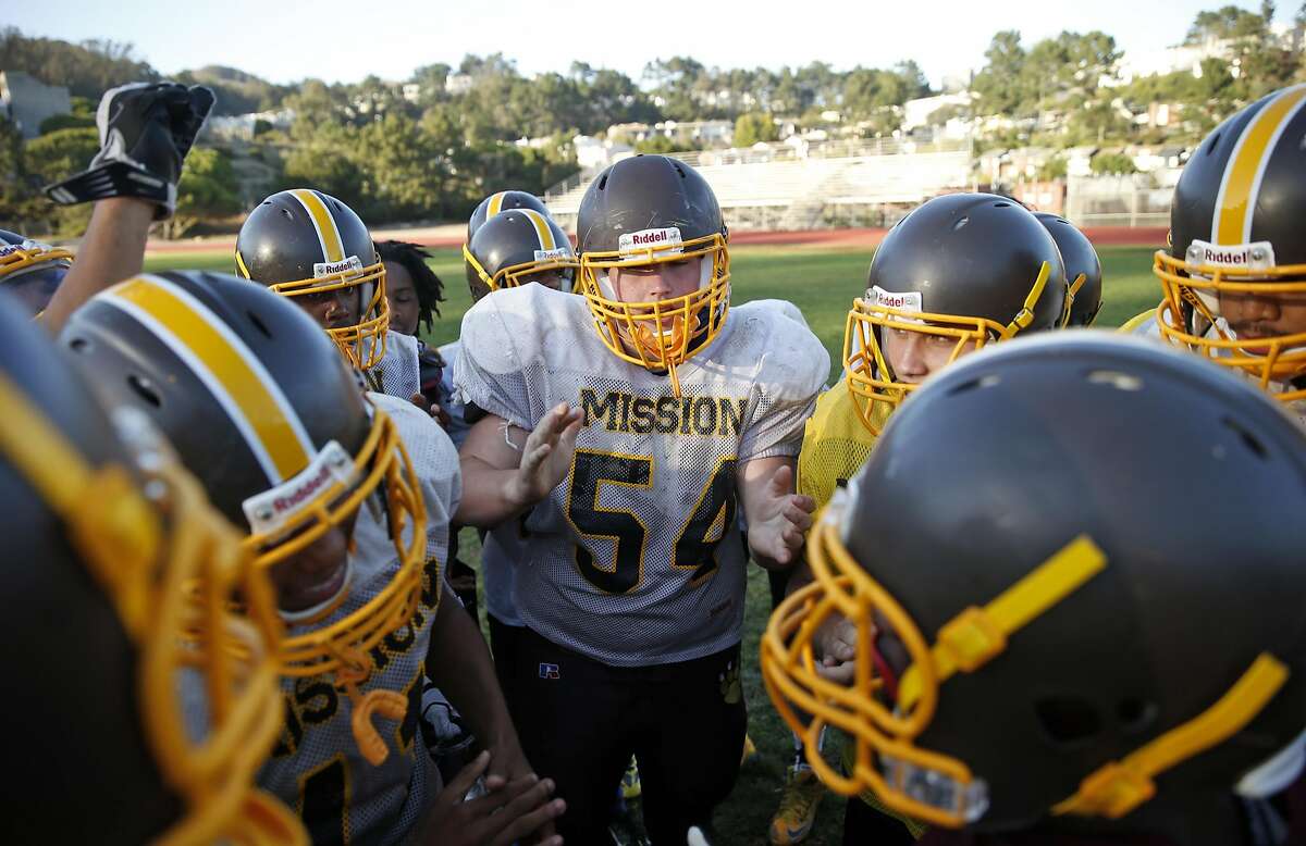Mission High School football's Brendan Shepherd (54) and teammates huddle during practice in San Francisco, Calif., on Wednesday, September 14, 2016.