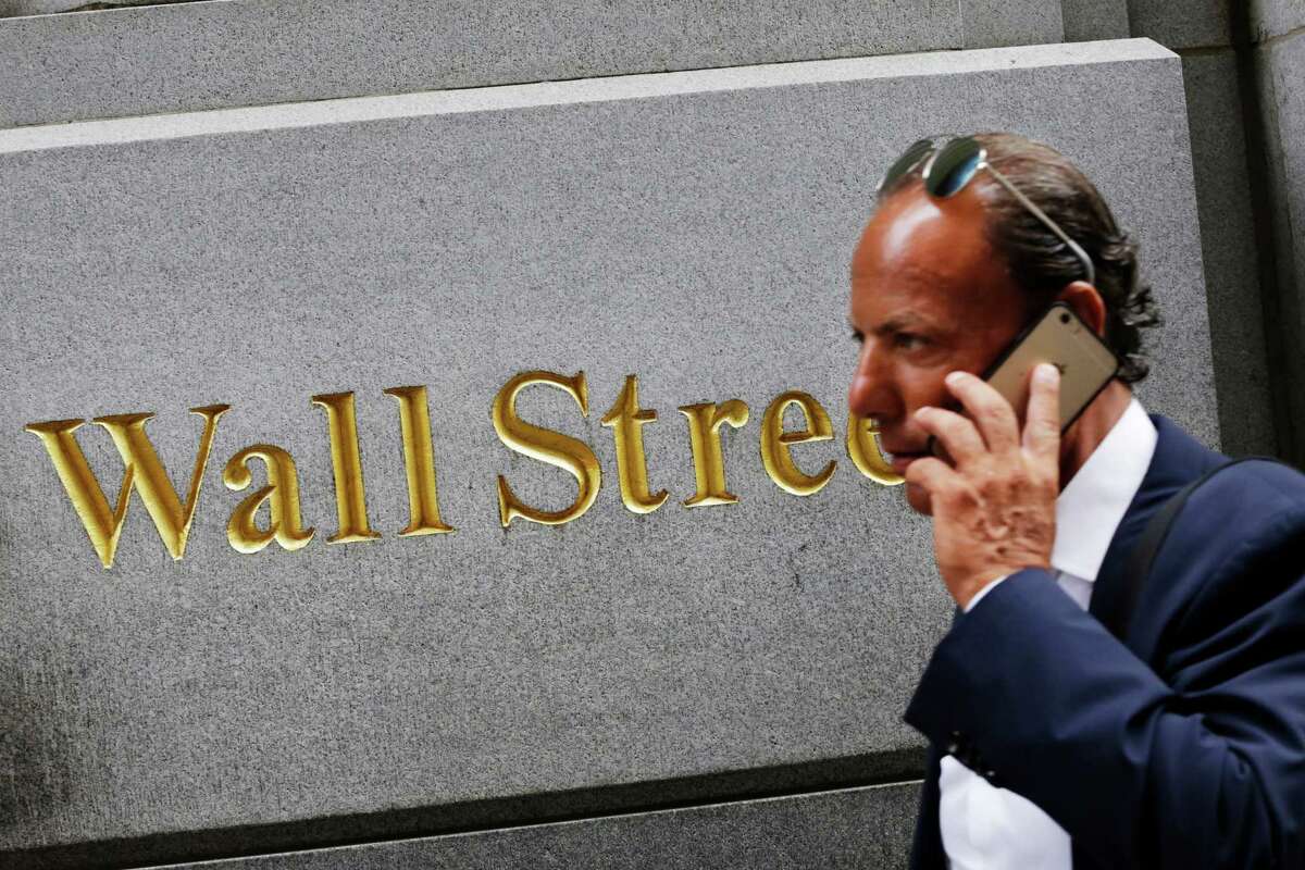 The Dow Jones industrial average gained 96 points early Wednesday, but those gains slipped away. ﻿