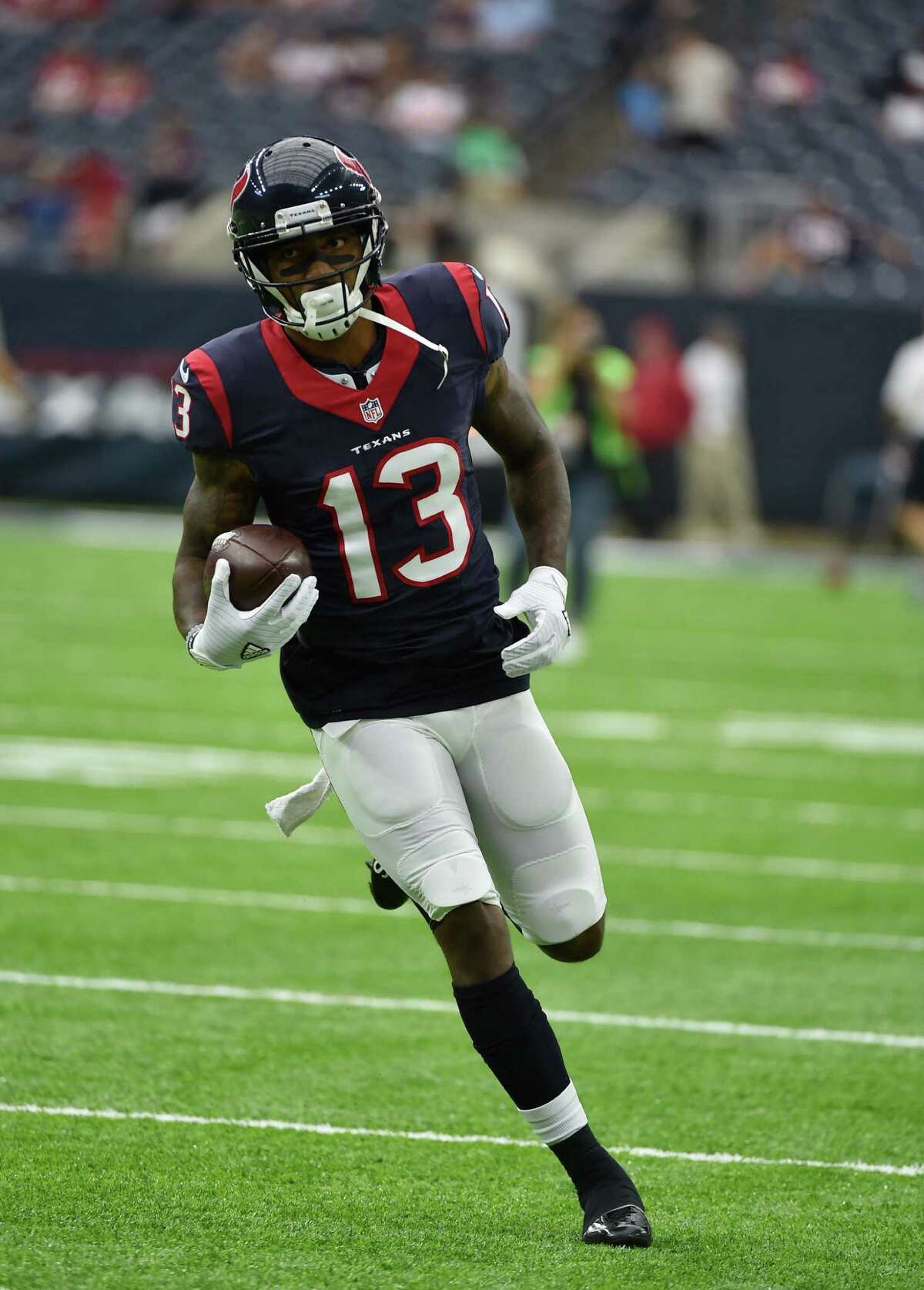 Wide receiver Braxton Miller of the Houston Texans is tackled by