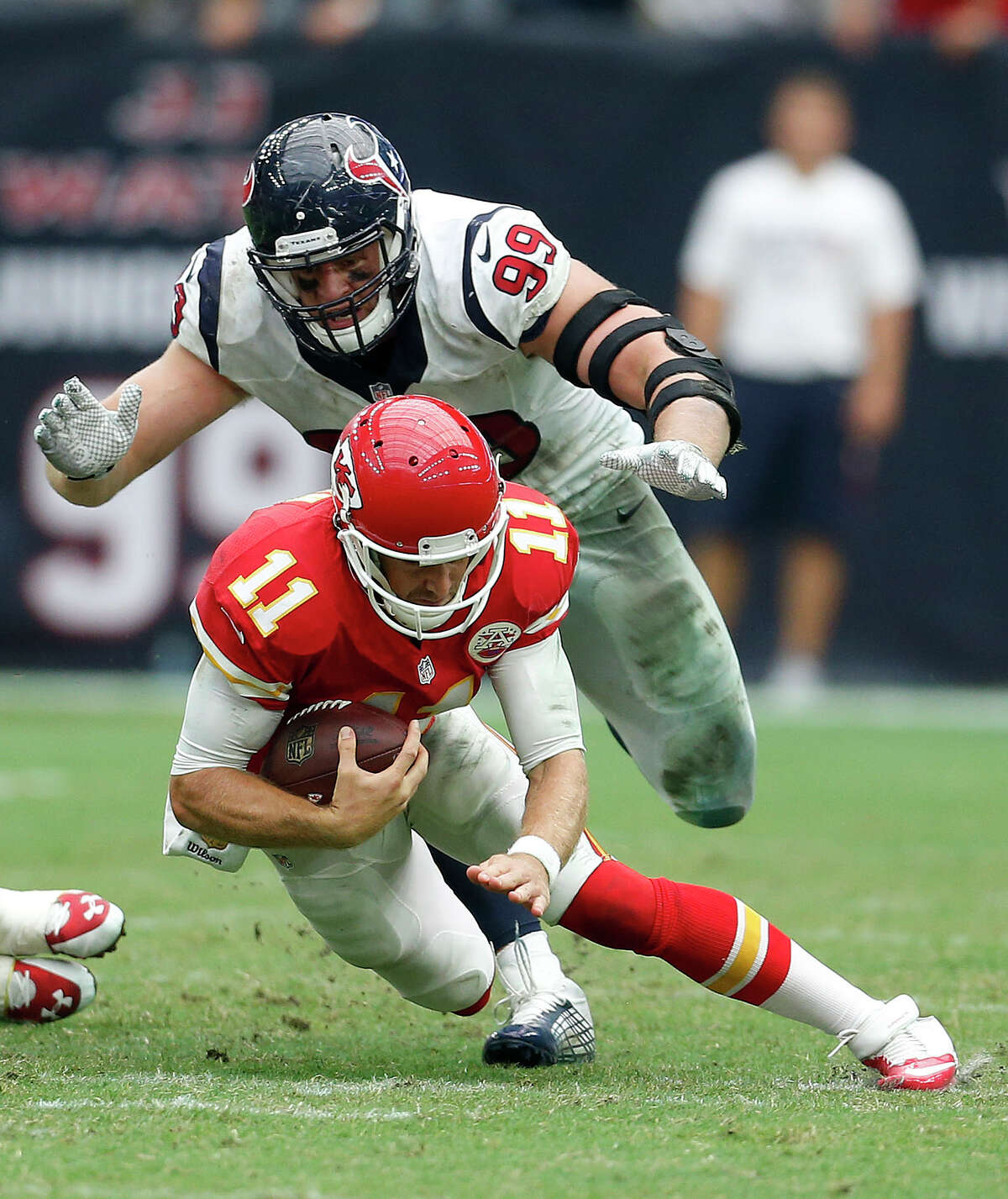 J.J. Watt (99) got the better of Chiefs quarterback Alex Smith on this sack last September, but Kansas City won the game 27-20, then beat the Texans 30-0 in the playoffs.