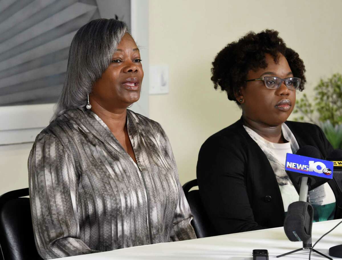 Gertha DePas, mother of Edson Thevenin, who was shot by Troy Police Sgt. French, left, is joined by her daughter-in-law Cinthia Thevenin during a press conference April 28, 2016, at the Empire Christian Center in Albany, N.Y. (Skip Dickstein/Times Union)