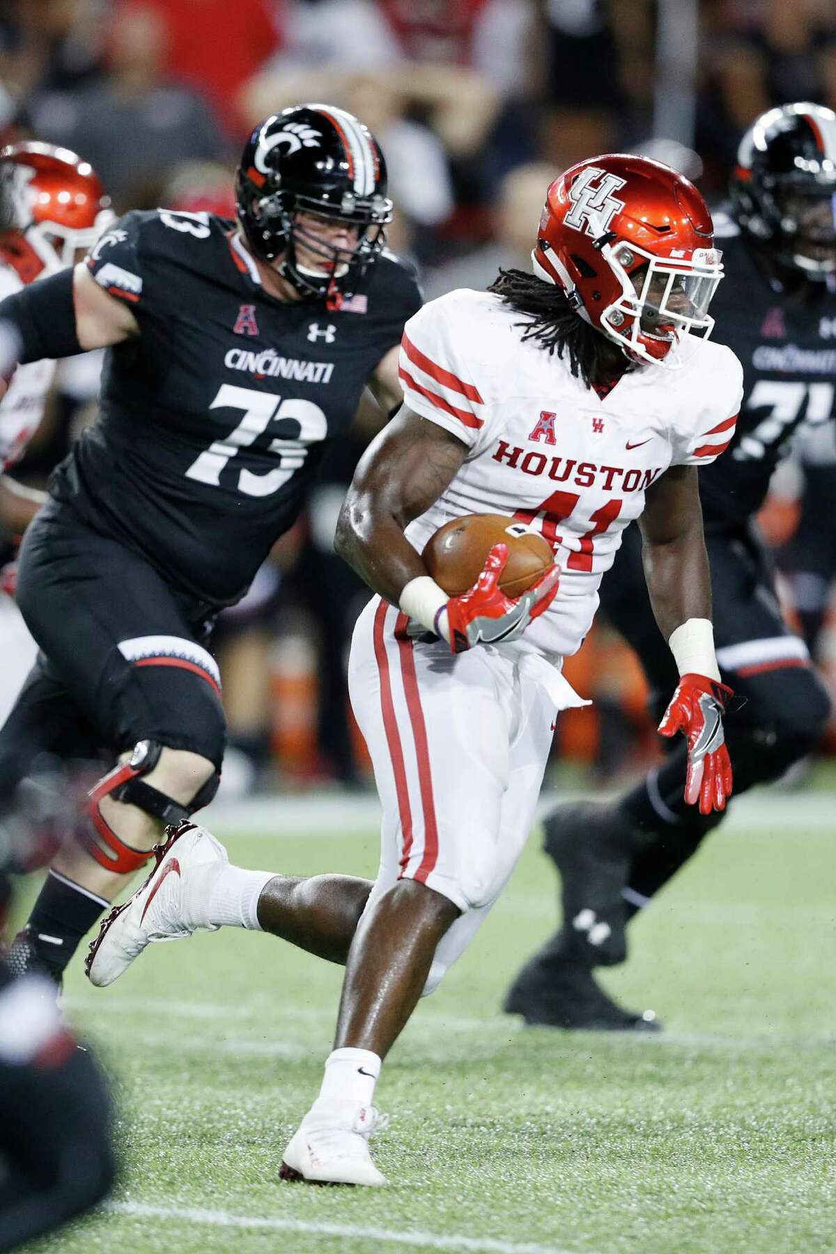 UH's Steven Taylor returns an interception 74 yards for a TD in the fourth quarter. It was the first of two in the quarter - Howard Wilson had the other.﻿