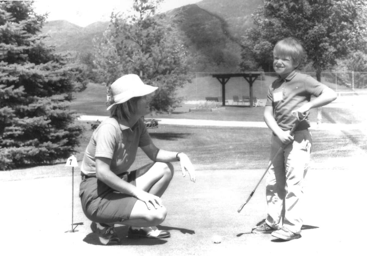 Sarah Hunter teaches during a junior golf clinic in the 1980s. Manchester Journal photo