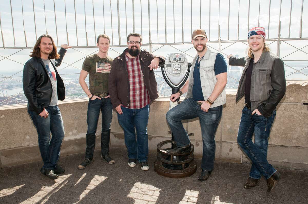 NEW YORK, NY - SEPTEMBER 25: (L-R) Tim Foust, Austin Brown, Rob Lundquist, Chris Rupp and Adam Rupp of the band 'Home Free', season 4 winners of NBC's The Sing-Off visit The Empire State Building at The Empire State Building on September 25, 2015 in New York City. (Photo by Noam Galai/WireImage)