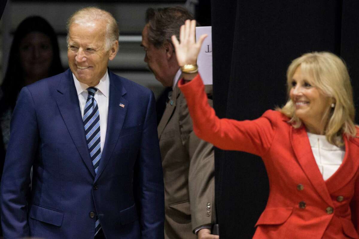 Vice President Joe Biden, left, and his wife, Dr. Jill Biden, arrive to Tudor Fieldhouse befrore the vice president's speech about the White House Cancer Moonshot, an initiative Biden leads, on the campus of Rice University on Friday, Sept. 16, 2016, in Houston.