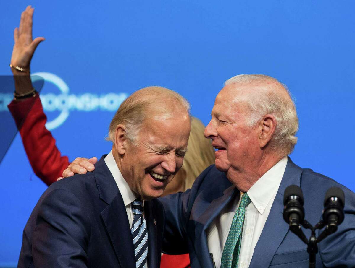 Vice President Joe Biden, left, is greeted by former secretary of state James A. Baker III as he arrives to Tudor Fieldhouse befrore the vice president's speech about the White House Cancer Moonshot, an initiative Biden leads, on the campus of Rice University on Friday, Sept. 16, 2016, in Houston.
