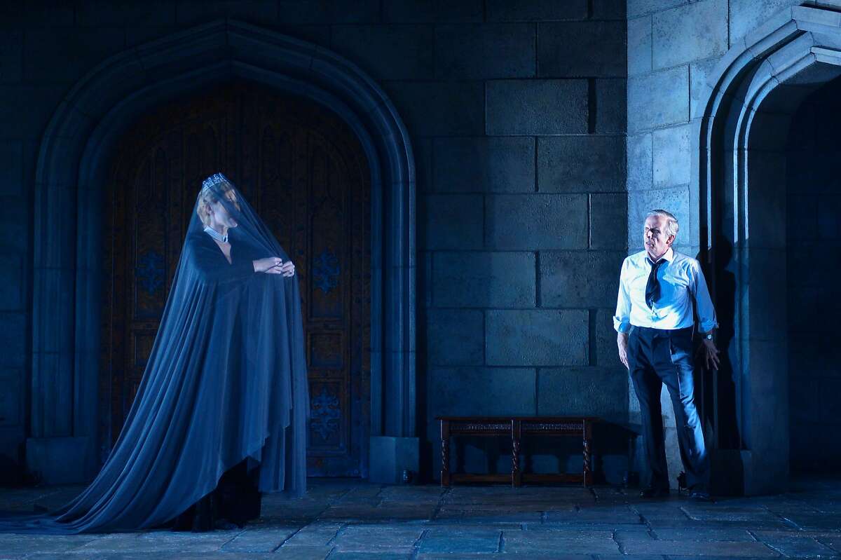 King Charles III (Robert Joy) is visited by a ghost (Chiara Motley) in ACT's "King Charles III."