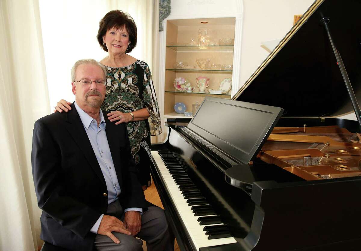 Husband and wife Robert Haydon and Martha Haydon pose for a photo at their living room with a 1908 Baldwin recital grand piano and a Steinway baby grand piano Thursday, Sept. 8, 2016, in Brenham. The Haydons have been providing music for Brehnam's First Baptist for 40 years and they are having a concert on September 25. ( Yi-Chin Lee / Houston Chronicle )