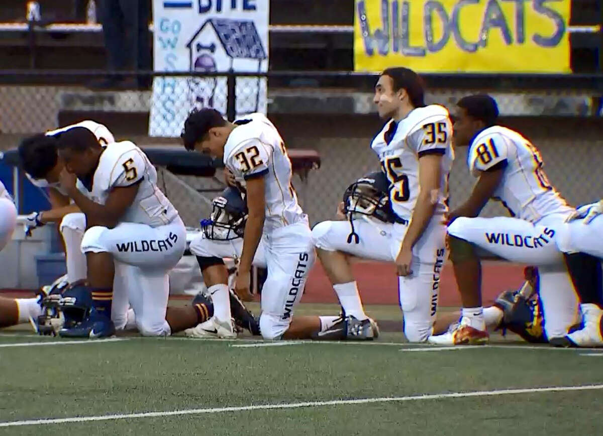 Some West Seattle High School football players also took a knee during the national anthem before their game against Garfield, Friday, Sept. 16, 2016.