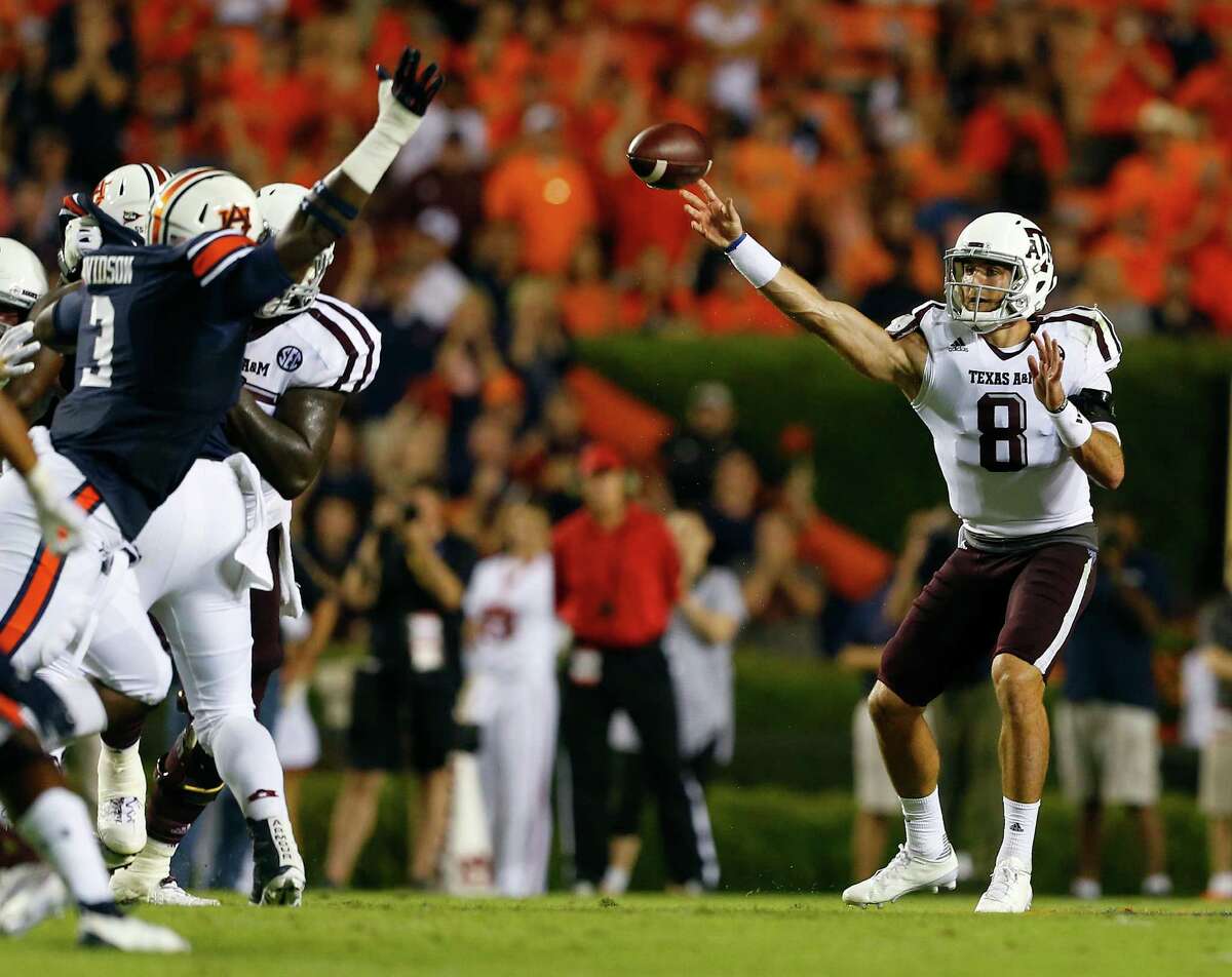 AUBURN, AL - SEPTEMBER 17: Quarterback Trevor Knight #8 of the Texas A&M Aggies throws a pass against the Auburn Tigers during the second half of an NCAA college football game on September 17, 2016 in Auburn, Alabama. Texas A&M Aggies won 29-16.