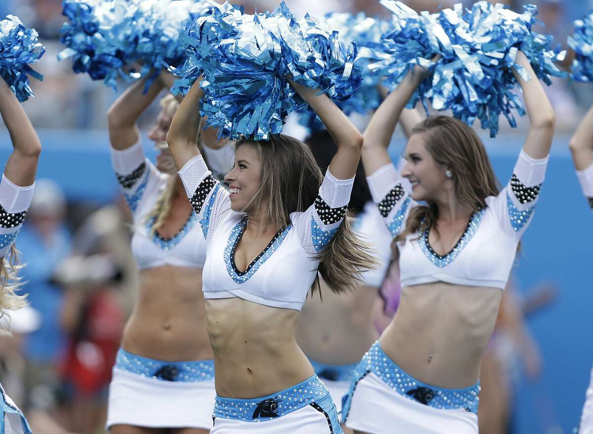 Carolina Panthers cheerleaders perform in the first half of an NFL football...